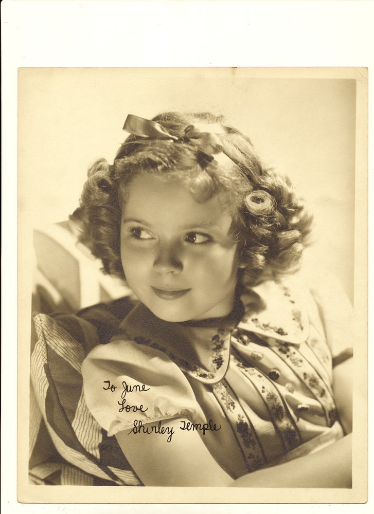 Item #4169 SIGNED Vintage 8x10 matte finish silver tone publicity portrait, circa 1935, signed and inscribed in black fountain pen. SHIRLEY TEMPLE.