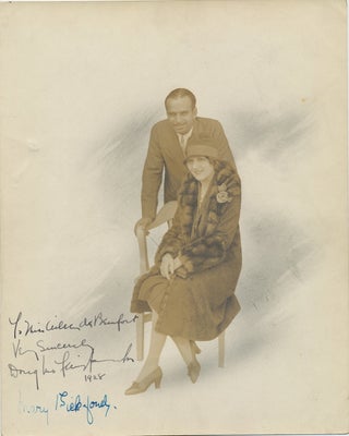 Item #4231 Fairbanks and Pickford Signed Color Photograph, 1928. MARY DOUGLAS FAIRBANKS, SR, AND...