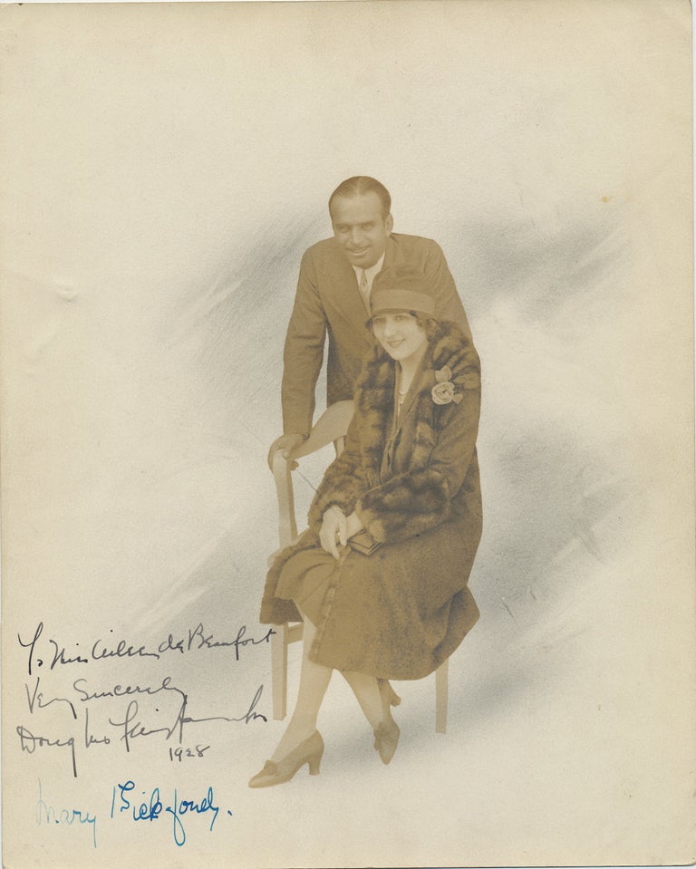 Item #4231 Fairbanks and Pickford Signed Color Photograph, 1928. MARY DOUGLAS FAIRBANKS, SR, AND PICKFORD.